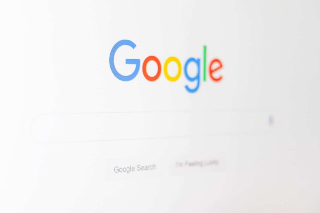 Close-up of the Google homepage, featuring the Google logo above the search bar on a white background—perfect for illustrating SEO concepts.