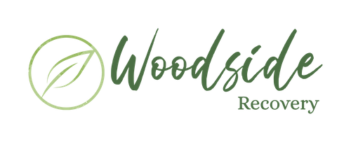 Logo for Woodside Recovery featuring a circular leaf design on the left and the words "Woodside Recovery" in green cursive and serif fonts.